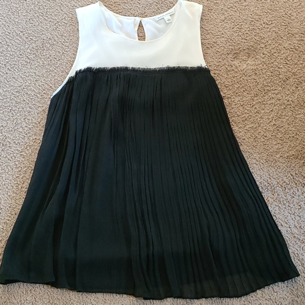 Black and white ruffled blouse